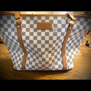 Great shape only used a handful of times w/ matching dbl zip wallet